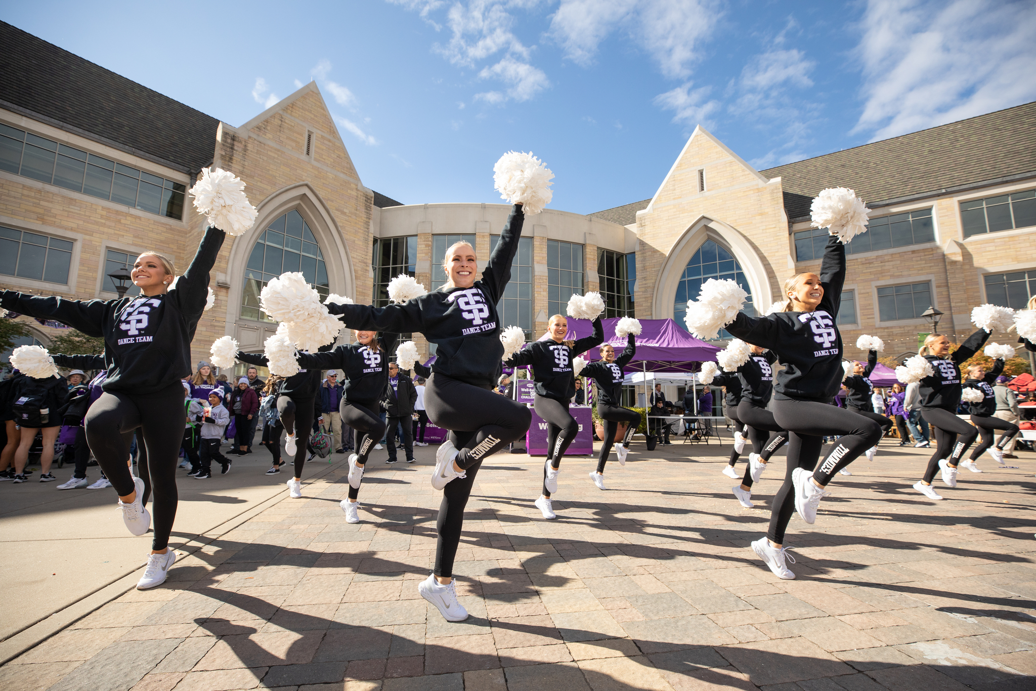 The Dance Team performs during Homecoming Purple on the Plaza