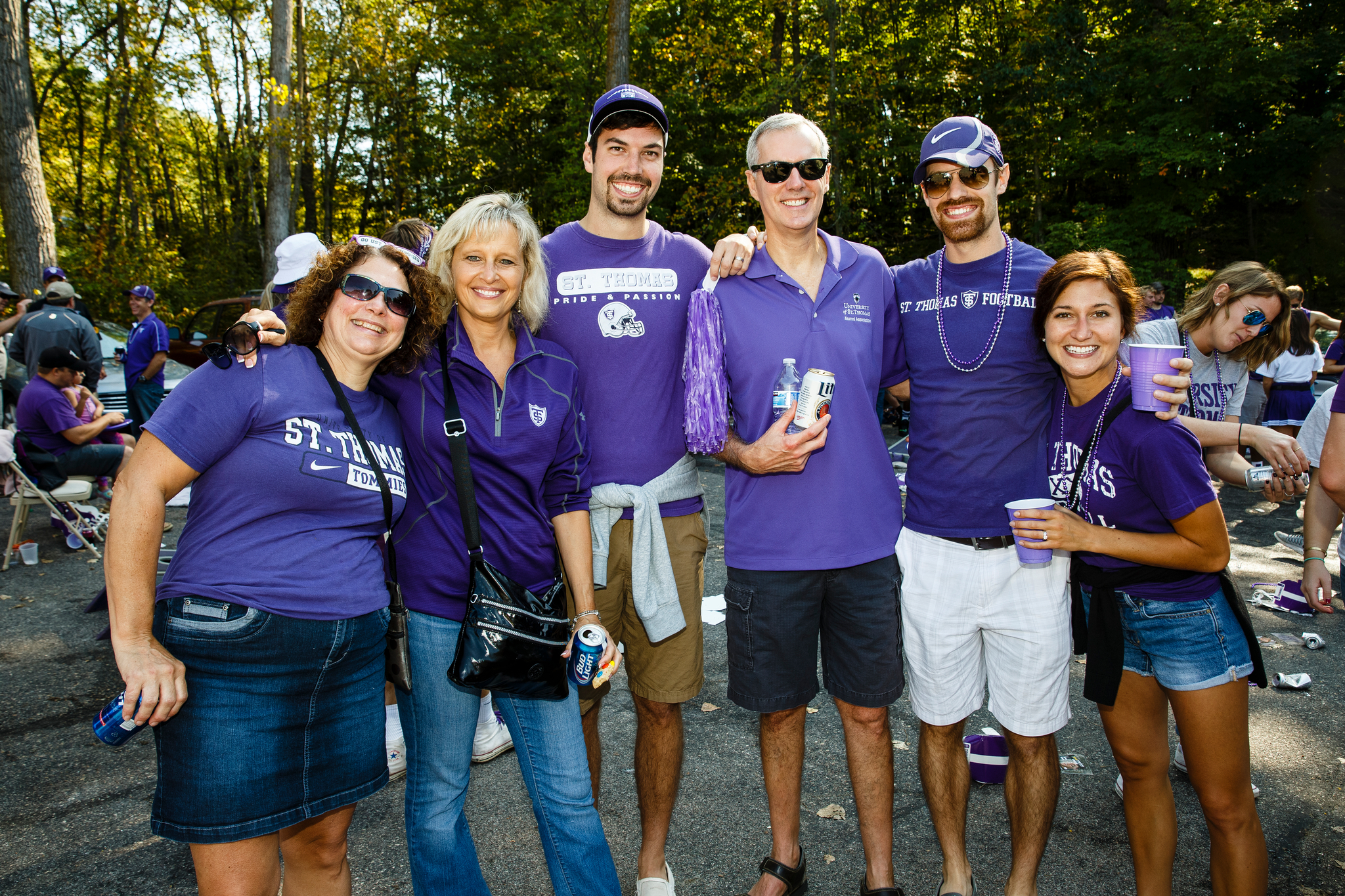 A group of alumni gathered at a tailgate before a 2018 game