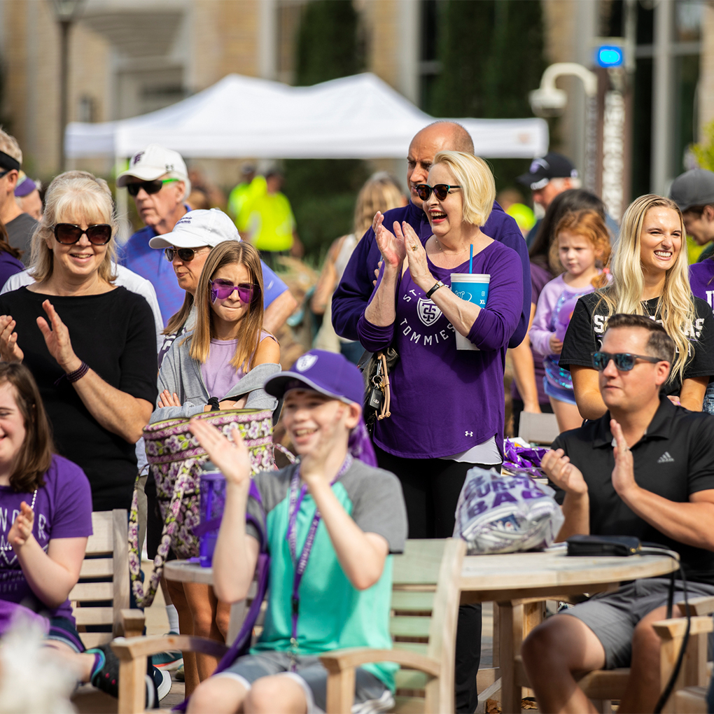 Students, faculty, staff, alumni, friends and family fill John P. Monahan Plaza for the Purple on the Plaza event during Family Weekend