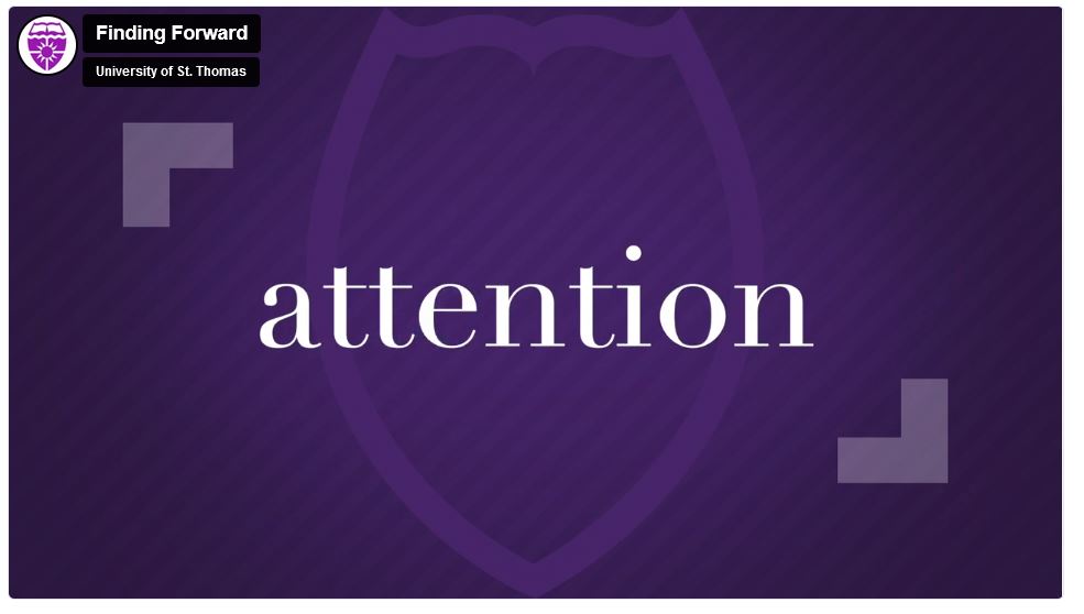 the word attention with the video icon superimposed over it