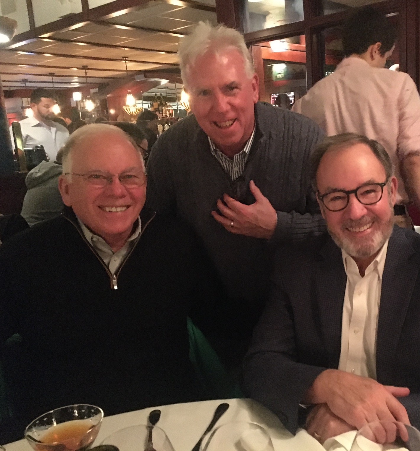 Ed Monk and fellow Tommies gathered at dinner