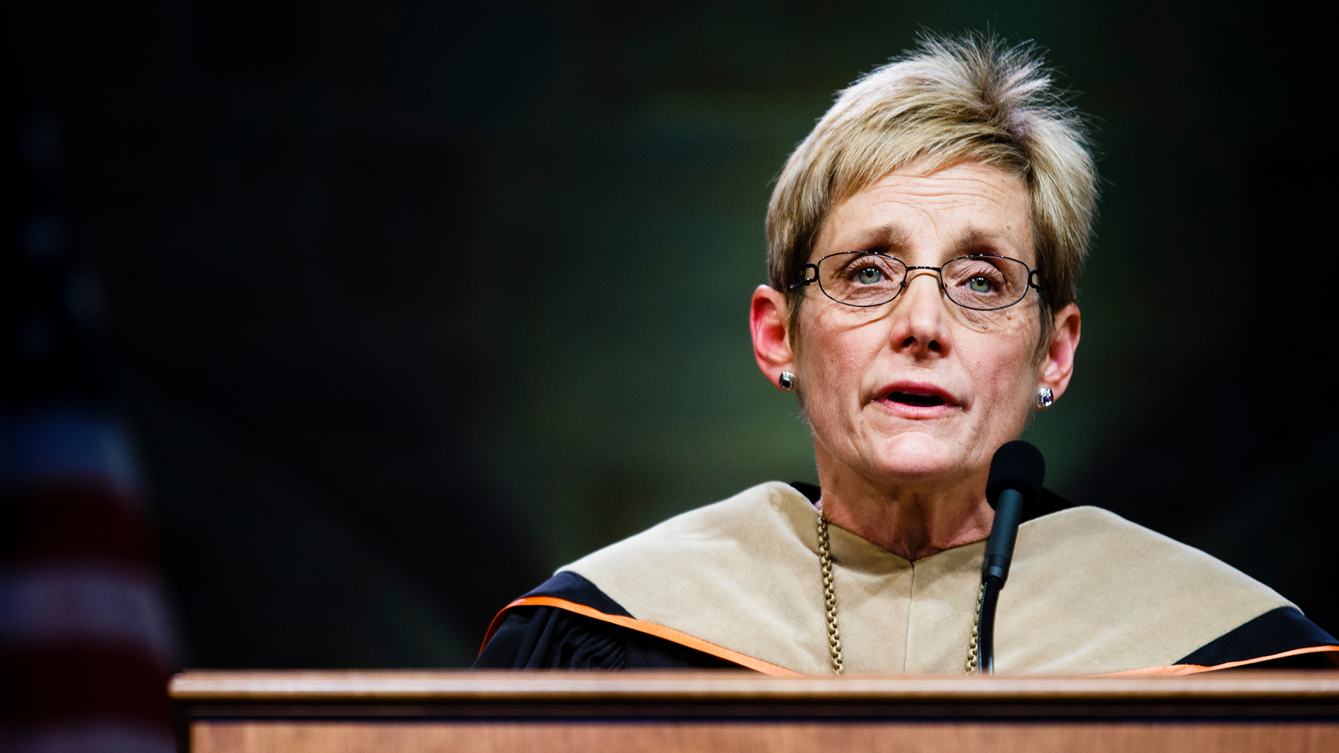 Julie Sullivan speaks from the podium at her inauguration 9 years ago
