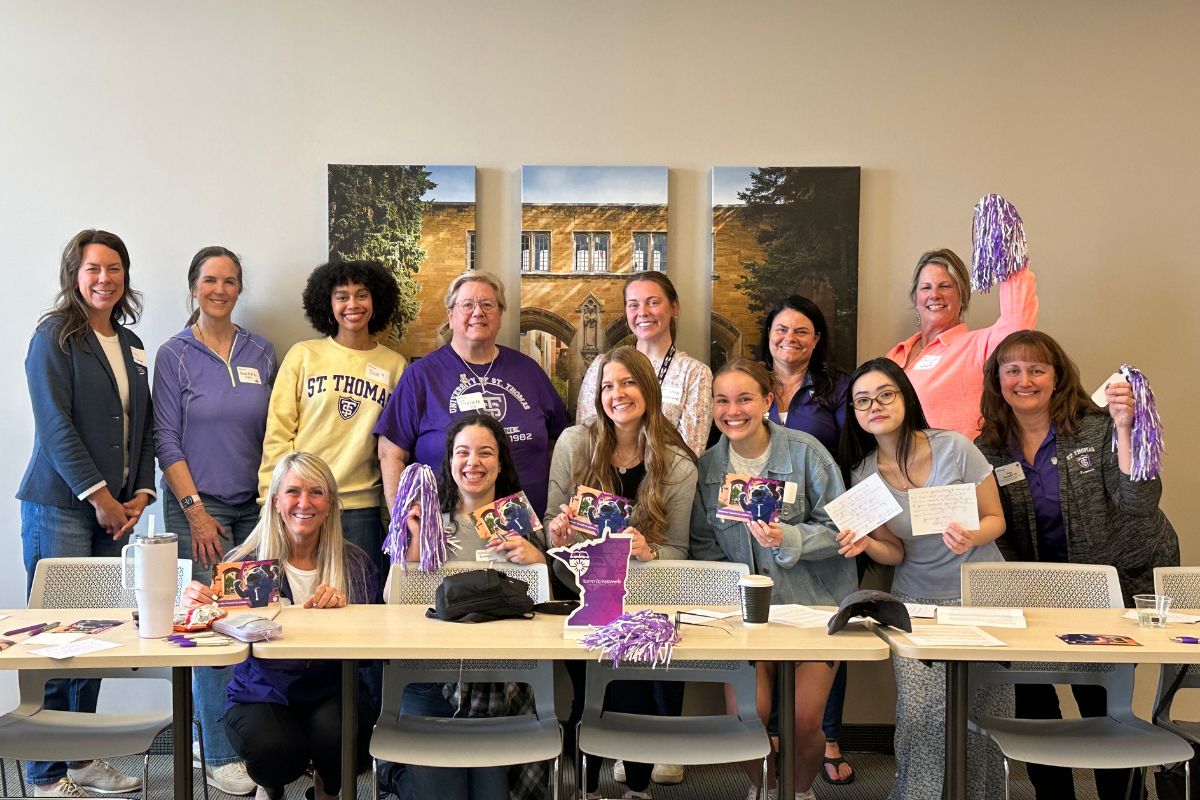 Tommies pose for a photo during Tommie Notes