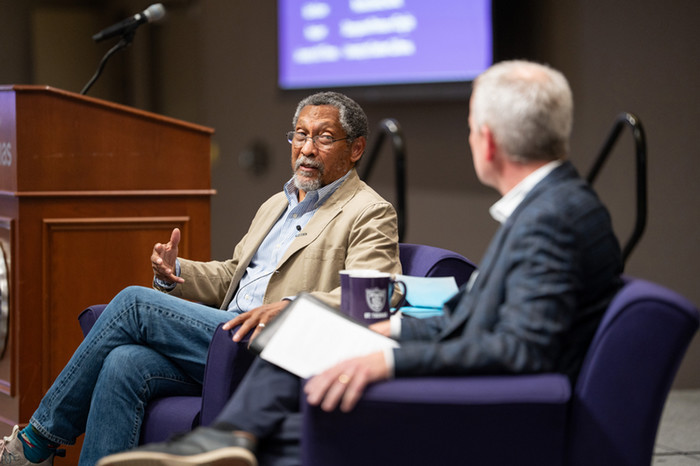 Percival Everett and President Rob Vischer sitting on stage at the Finding Forward event talking