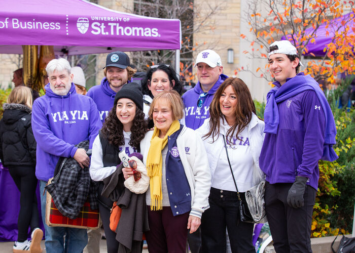 Students and alumni gather on the plaza for Homecoming festivities.