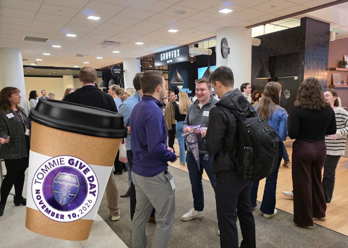 Alumni at Gray Fox Coffee Shop in downtown Minneapolis