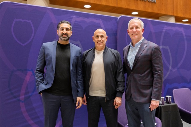 President Vischer poses for a photo on stage with Marc Lore and Vik Uppal