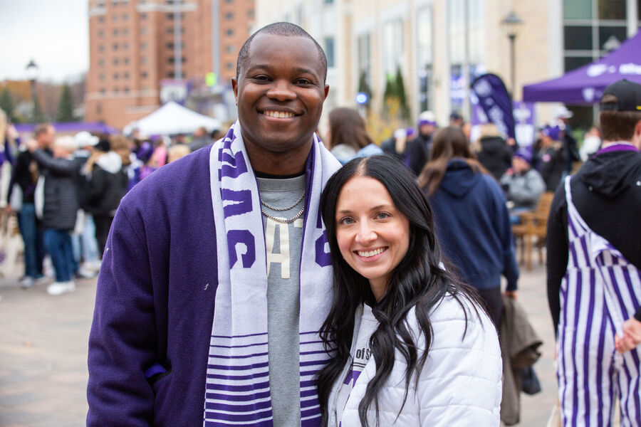 Alumni gather on Monahan Plaza to enjoy Homecoming festivities. 
