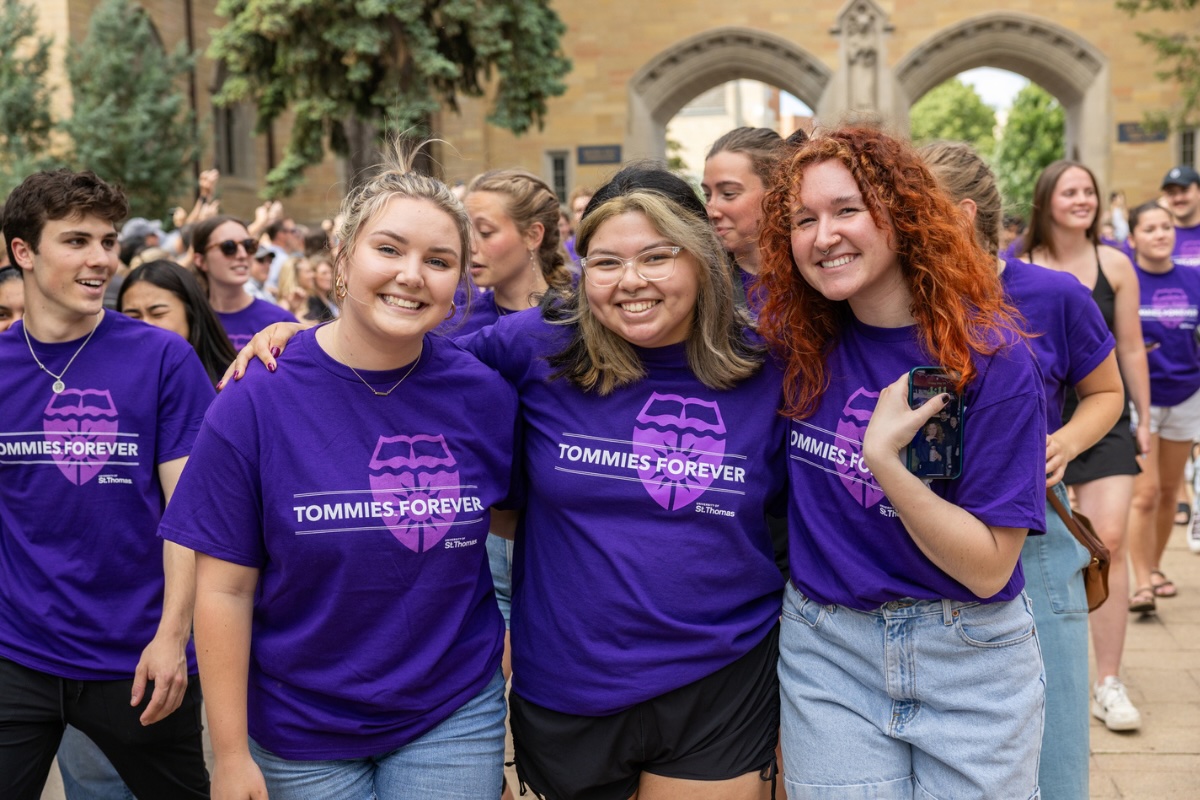 Students celebrate the end of their senior year during the March Out of the Arches