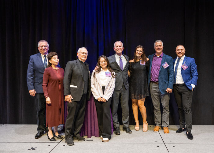 Honorees pose for a photo at St. Thomas Day 2-24 in Woulfe Alumni Hall