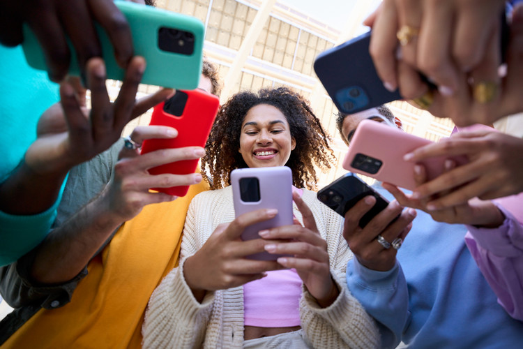 People scrolling on cell phones.