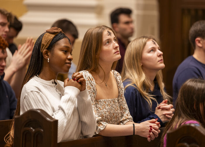 Students pray in Chapel of St. Thomas Aquinas