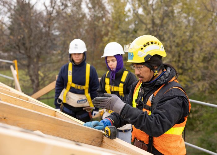 Center for Common Good Volunteers work on Habitat for Humanity project. 