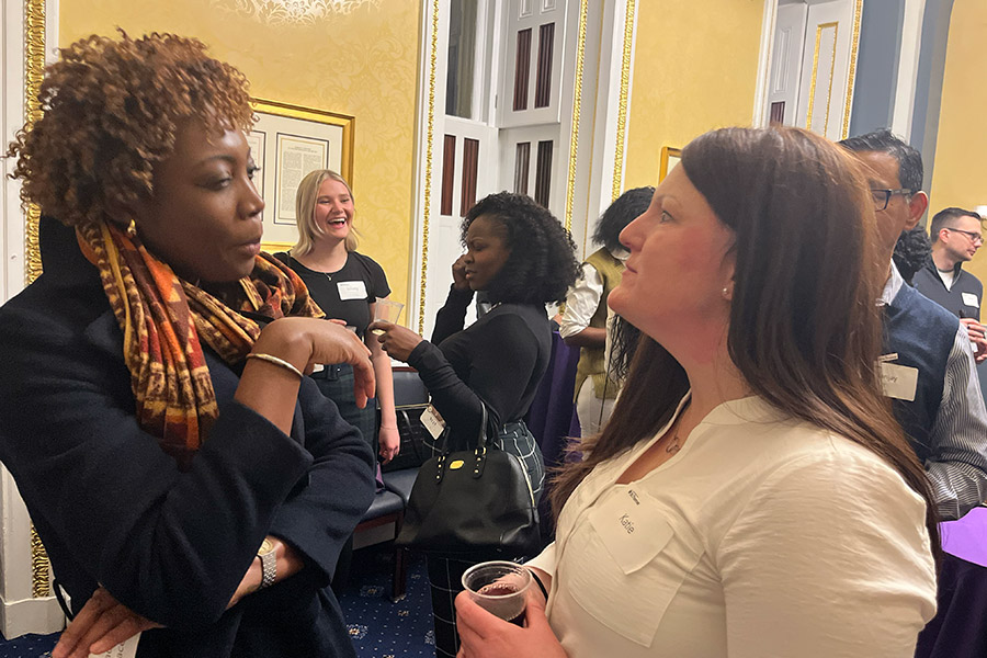 Alumni talk during St. Thomas networking event