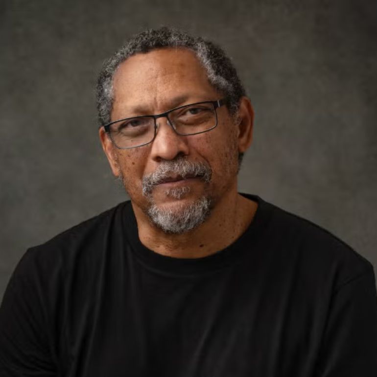 Percival Everett looks into the camera for a studio portrait