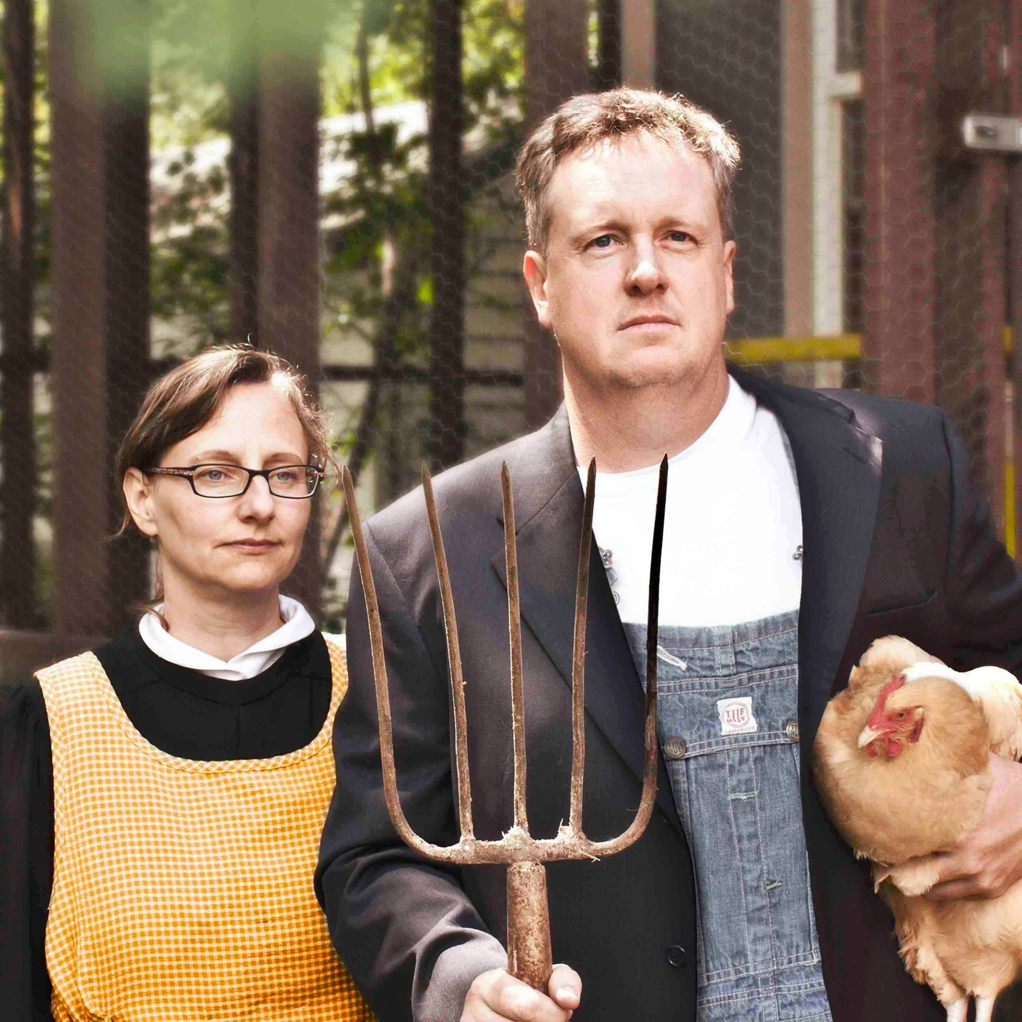 jason and lucie amundsen recreating Grant Wood's American Gothic